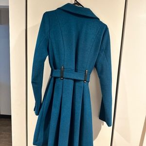 Long jacket with fancy skirt